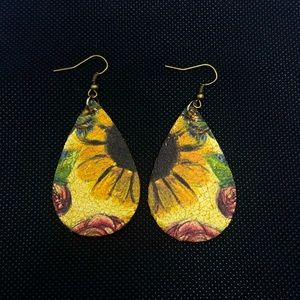 Faux sunflower tear drop leather earrings.